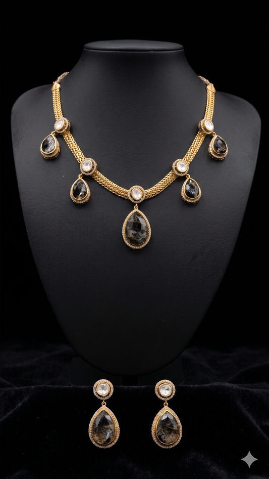 Sophisticated Dark Gemstone and Gold Jewellery Set